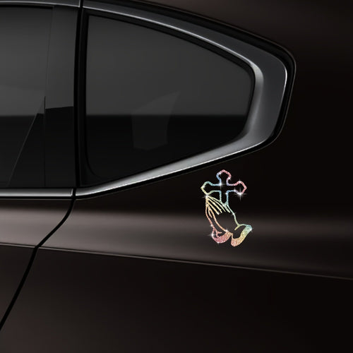 A Shiny Sticker Of A Cross With Hands Clasped In Prayer For Cars