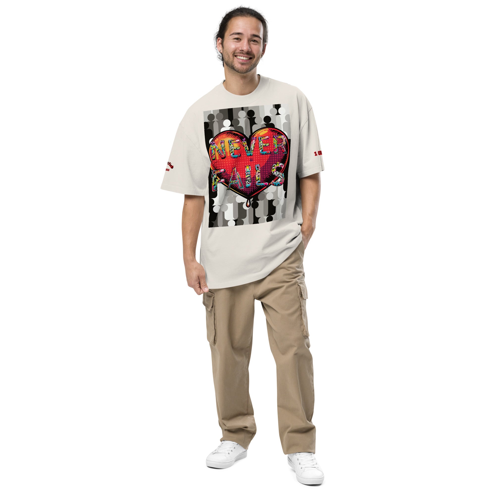 LOVE NEVER FAILS- Oversized faded t-shirt